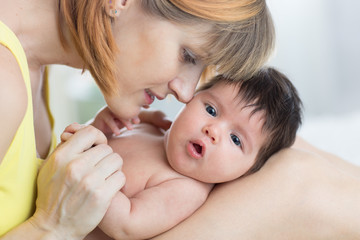 Happy mother and newborn baby