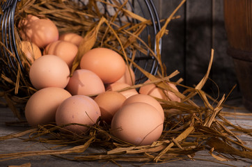 Closeup of Brown Chicken Eggs Spilled From a Basket