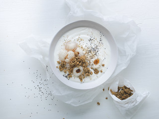 white yoghurt bowl with litchi and chia seeds