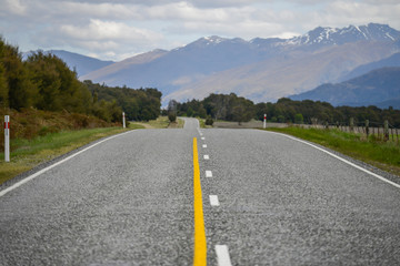 Highway road to mountains in New Zealand