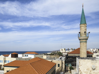 Obraz premium Acre or Akko, Israel - view of the typical domes, minarets and roofs of the old city of Acre.