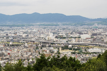Fototapeta na wymiar View of Kyoto skyline from from Inariyama mountain in September. Kyoto, Japan.