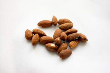 Organic almonds isolated on the white background