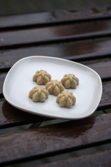 Vegan halva of sesame on the white plate