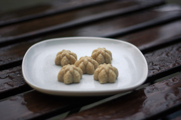 Vegan halva of sesame on the white plate