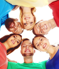 Group of happy students staying together.