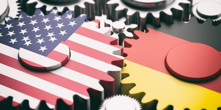 Germany and US of America flags on metal cogwheels. 3d illustration