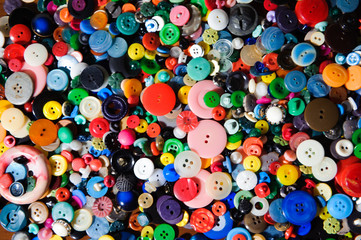 Sewing buttons background. Colorful sewing buttons texture