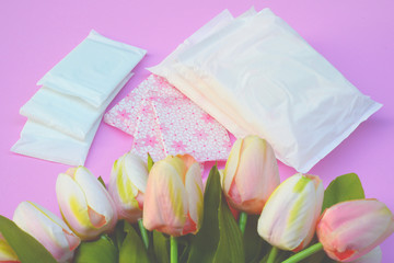 Fototapeta na wymiar Sanitary napkins, pad (sanitary towel, sanitary pad, menstrual pad) on pink background. 