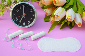 Sanitary napkins, pad (sanitary towel, sanitary pad, menstrual pad) on pink background.
