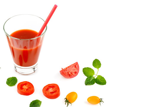 Fresh tomato juice and tomatoes isolated on white background. Free space for text.