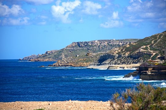 View along the rugged coastline towards Marsalforn, Gozo, Malta.