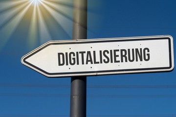 Obraz premium Ein Richtungspfeil zeigt auf Digitalisierung