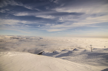 peaks of mountains above the clouds