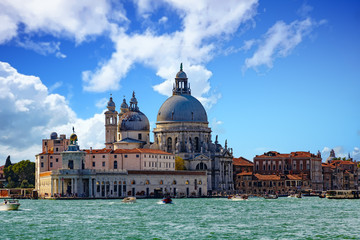 Fototapeta na wymiar Venetian Church with Boats on Canal