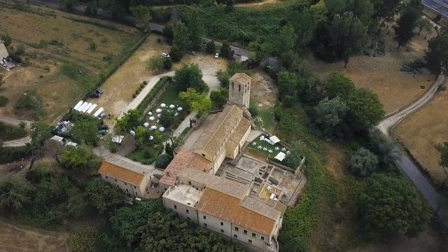 Aerial view of old Italian church hosting wedding