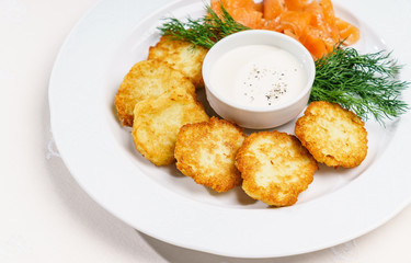 potato pancakes with sour cream