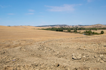 Plowed field ready to be cultivated in Val d'Orcia, Tuscany