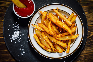 Chips on wooden background