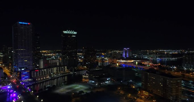 Aerial nigth drone video Tampa Downtown city lights and River