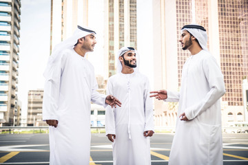 Arabian businessmen meeting outdoors
