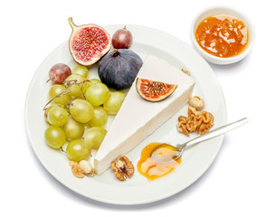 Piece of brie or camambert cheese on a white background