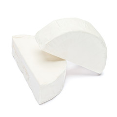 Piece of brie or camambert cheese on a white background