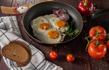 making breakfast with fresh eggs