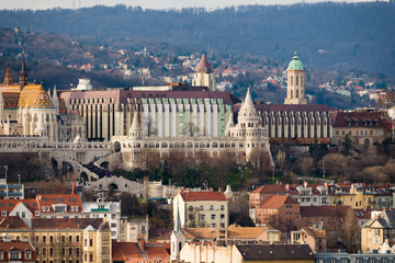 Fototapeta na wymiar Fisherman's Bastion and cityscape of Budapest from dome terrace of St. Stephen's Basilica in BudaPest, Hungary.