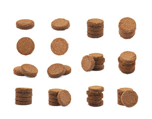 Compressed compost tablet isolated