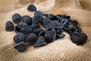 Fresh orecchiette pasta made with cuttlefish ink