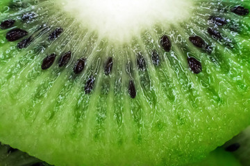 Kiwi fruit fresh natural close-up. Cut slices macro.