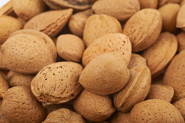 Fototapeta na wymiar Surface coated with almond nuts