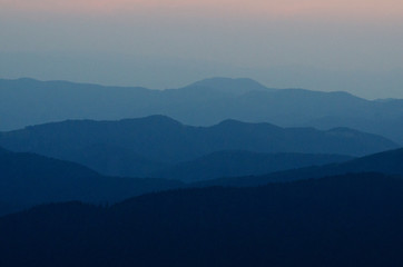 Photo of the mountains after sunset.