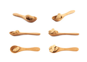 Spoon full of peanuts isolated