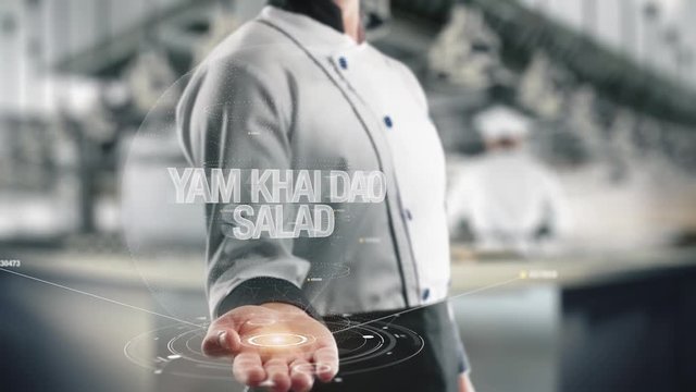 Chef holding in hand Yam khai dao Salad