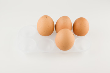 Four fresh rustic eggs