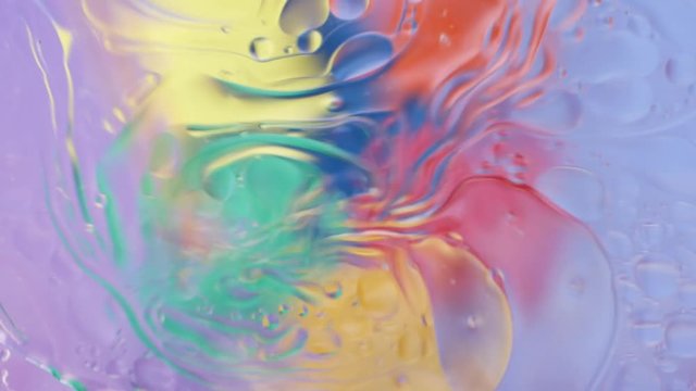 Background of a colored abstract through a water lens with vegetable oil