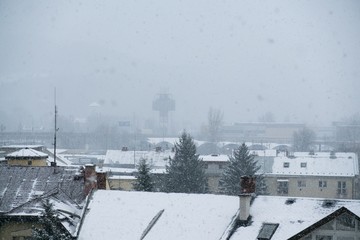 Fototapeta premium Snowfall in the town. Slovakia