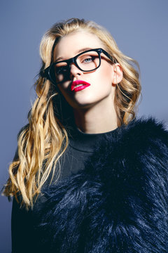 spectacles and fur coat
