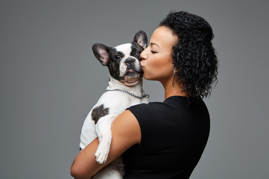 Young Woman With French Bulldog Dog