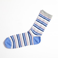 blue striped socks on white background