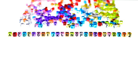 Fototapeta premium English alphabet letters on a white background with a blank spac