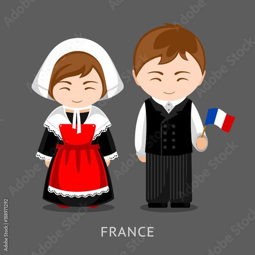 "French in national dress with a flag. Man and woman in traditional ...