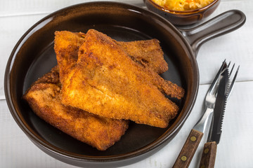Pieces of cod in breadcrumbs.