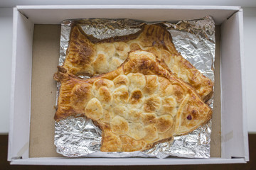 Baking in the form of fish. Food cooked at home with their own hands.