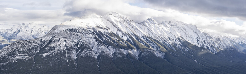 Fototapeta na wymiar Panorama of majestic snow covered mountain range
