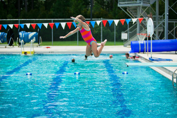 Little Girl Swim Lessons off Diving Board