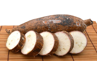 Close up view of the cassava root isolated on a white background.