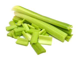 fresh celery stems on a white background